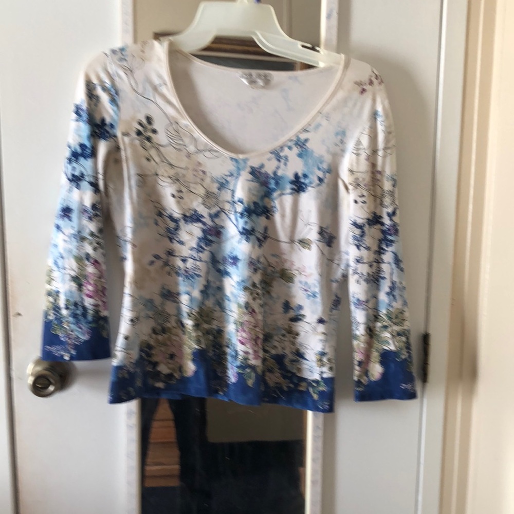 Woman’s shirt. Brand: Casual Corner. Size: M. Color: Blue/white print.